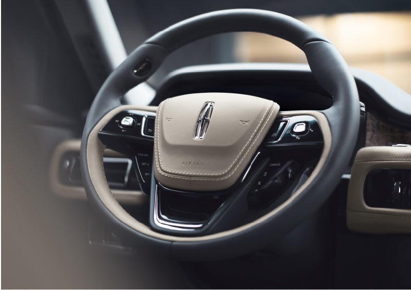 The intuitively placed controls of the steering wheel on a 2023 Lincoln Aviator® SUV | Star Lincoln in Southfield MI